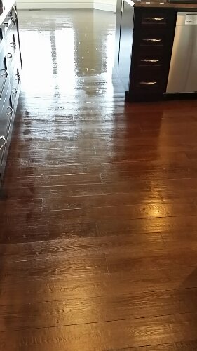 Recoat of a Prefinished Hand-Scraped Dark Oak Floor